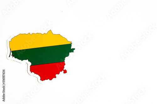 National flag of Lithuania. Country outline on white background with copy space. Politics illustration