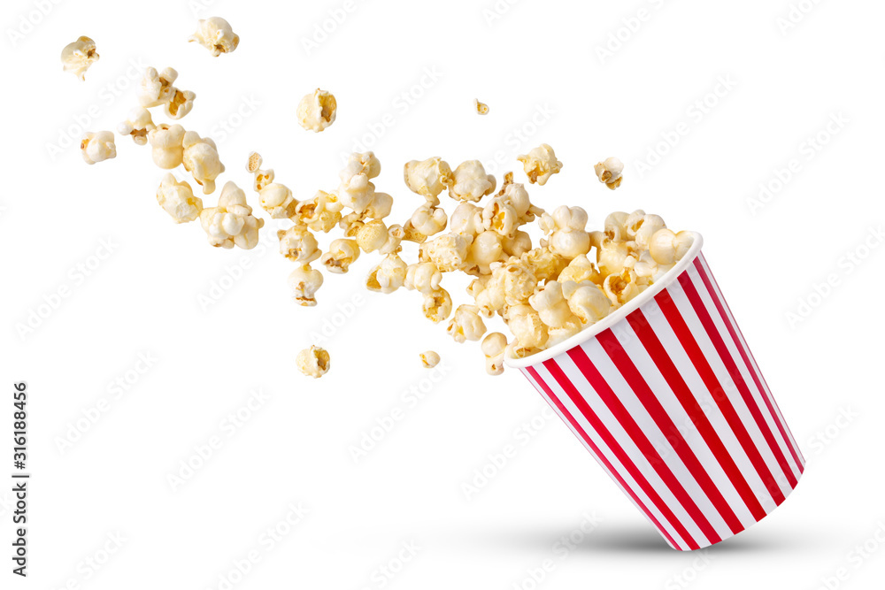 Popcorn viewed float Paper cup with popcorn on white isolated . - obrazy, fototapety, plakaty 