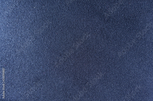 Dark blue simple jersey fabric from above