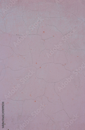 Beautiful pink textured stucco on the wall.