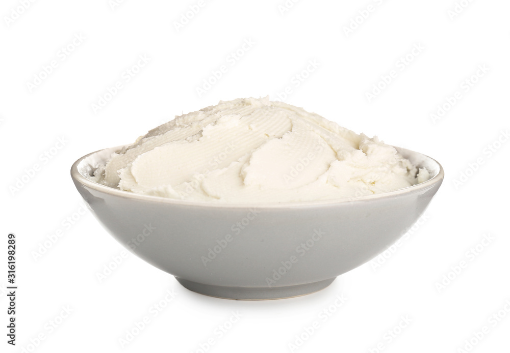 Bowl with tasty cream cheese on white background Bowl with tasty cream cheese on white background