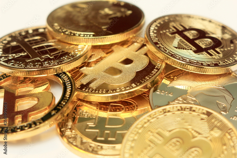 Lots of bitcoin coins on a colored background Lots of bitcoin coins on a colored background