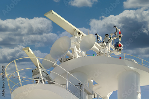 Photography Top of a cruise ship showing satellite and sonar receiver