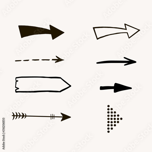 Set of arrows. Vector freehand drawing in doodle style. Collection of different arrows