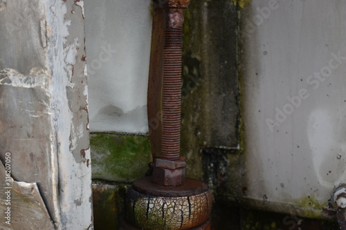 Rusted threaded bolt on vintage equipment