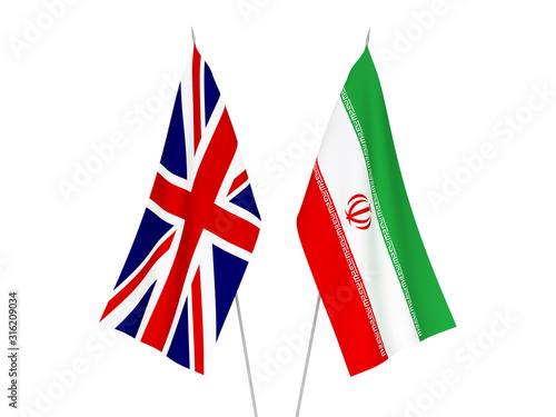 National fabric flags of Great Britain and Iran isolated on white background. 3d rendering illustration.