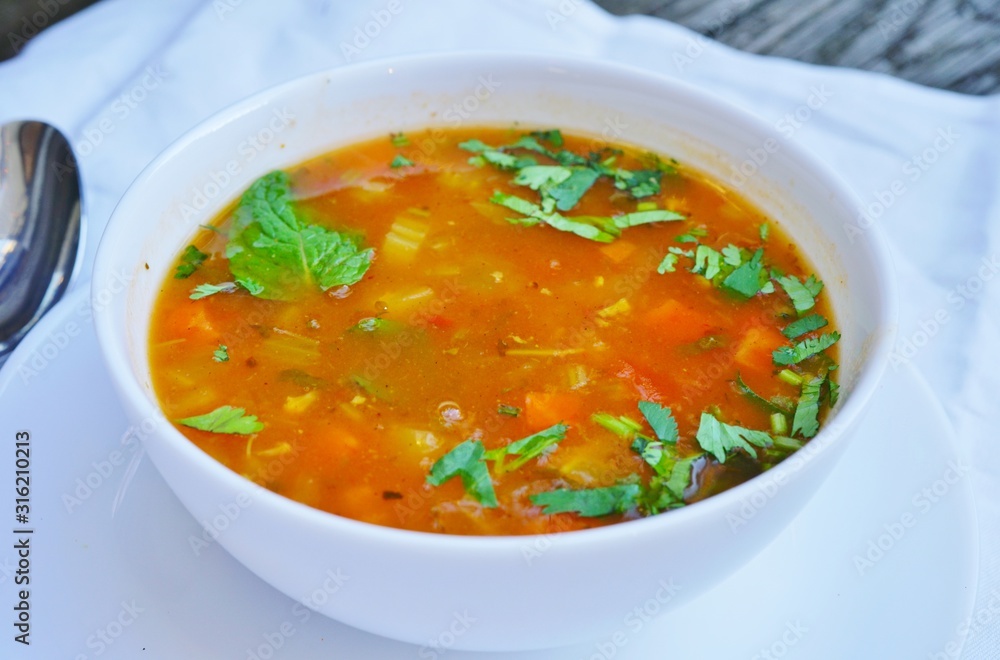A bowl of hot and sour vegetable soup at an Indian restaurant A bowl of hot and sour vegetable soup at an Indian restaurant