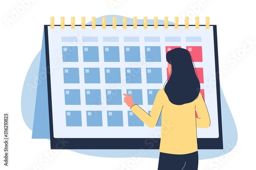 Woman looking at monthly calendar - menstruation cycle control banner