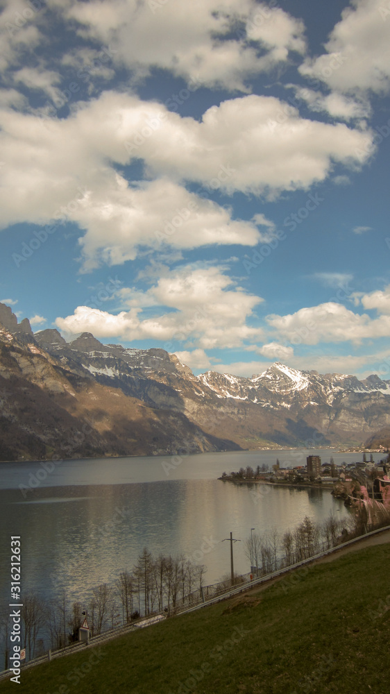 hiking country around the alpine lake near Murg Switzerland