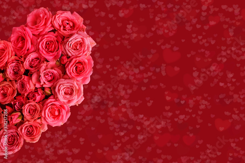 Valentine s day romantic greeting card. Composition with a heart of pink roses on a red background.Mothers day. 8 Marth. Banner for advertising store  website  posters  advertising  coupons.