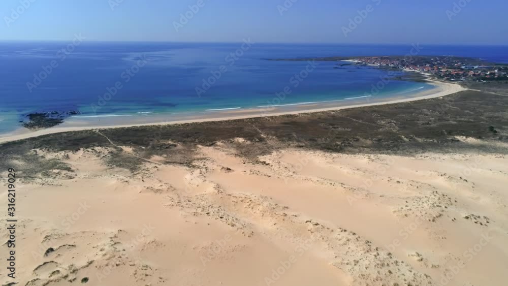Dunes of Corrubedo and view of blue coloured ocean. Galicia, Spain. Dunes of Corrubedo and view of blue coloured ocean. Galicia, Spain.