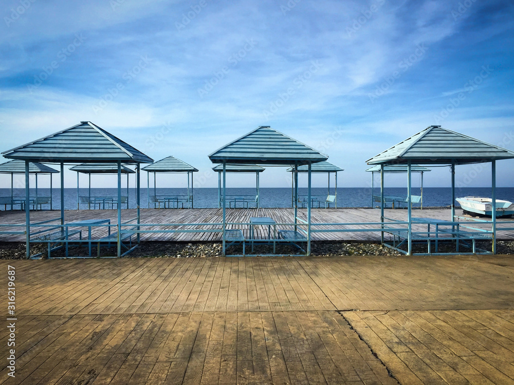 tents on an empty sea beach