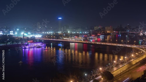 Time lapse shot at night for Nile river in Cairo Egypt photo