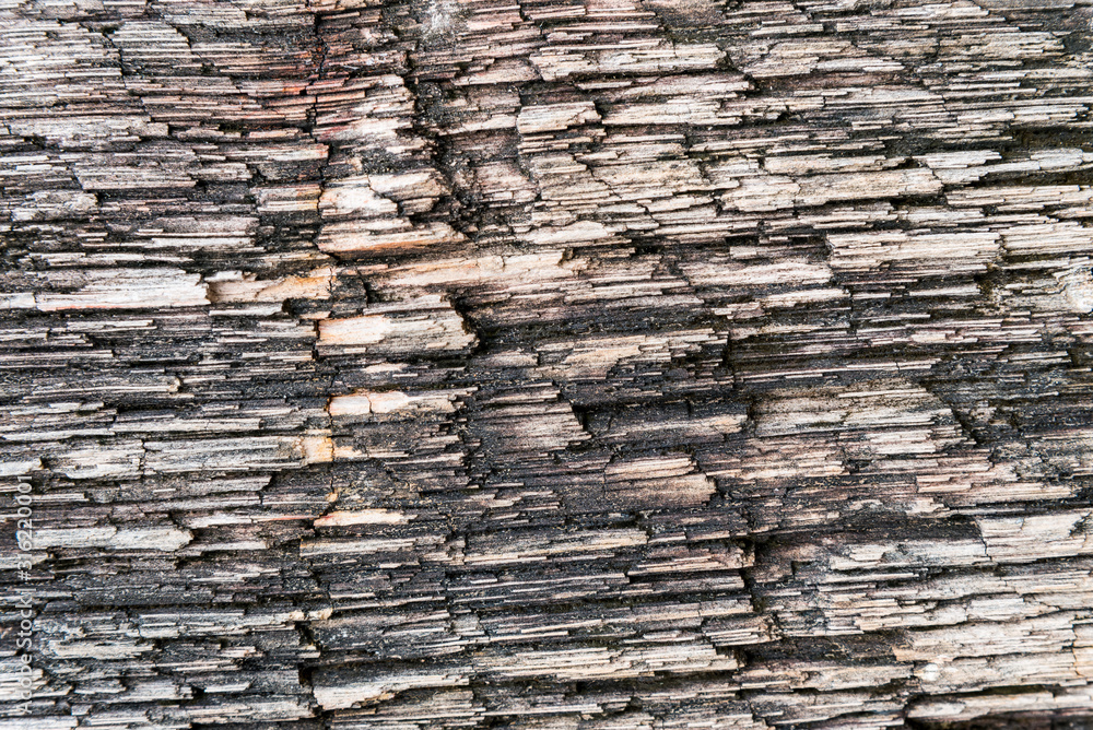 Rough texture pattern of the old black and white grunge stone surface, Strong structure durable nature of rock for abstract background Rough texture pattern of the old black and white grunge stone surface, Strong structure durable nature of rock for abstract background