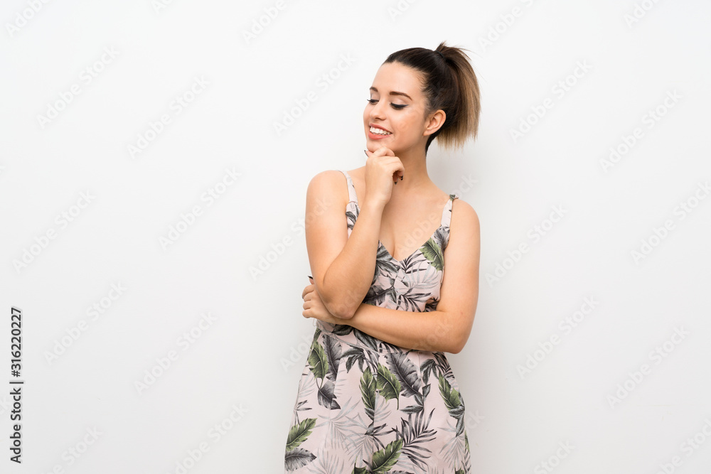 Young woman over isolated white background looking to the side Young woman over isolated white background looking to the side