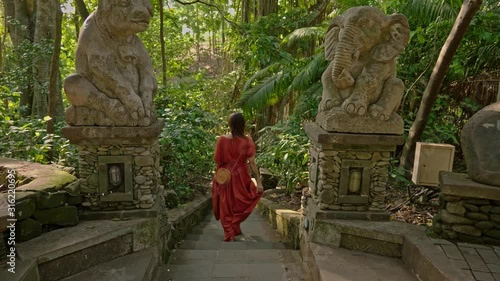 Woman at monkey forest at Ubud, Bali photo