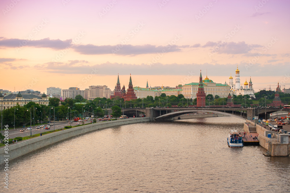 Moscow Kremlin at Moscow River, Russia. Panorama of old Moscow in summer evening. Beautiful cityscape of the famous Moscow center.