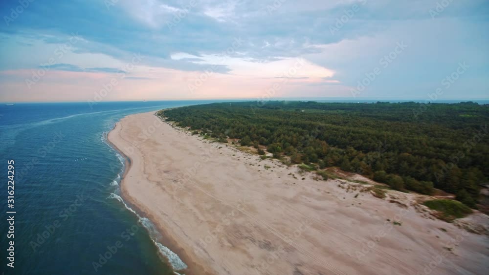 Aerial view of the Hel peninsula, shot from fast and low flying helicopter, high quality prores Aerial view of the Hel peninsula, shot from fast and low flying helicopter, high quality prores