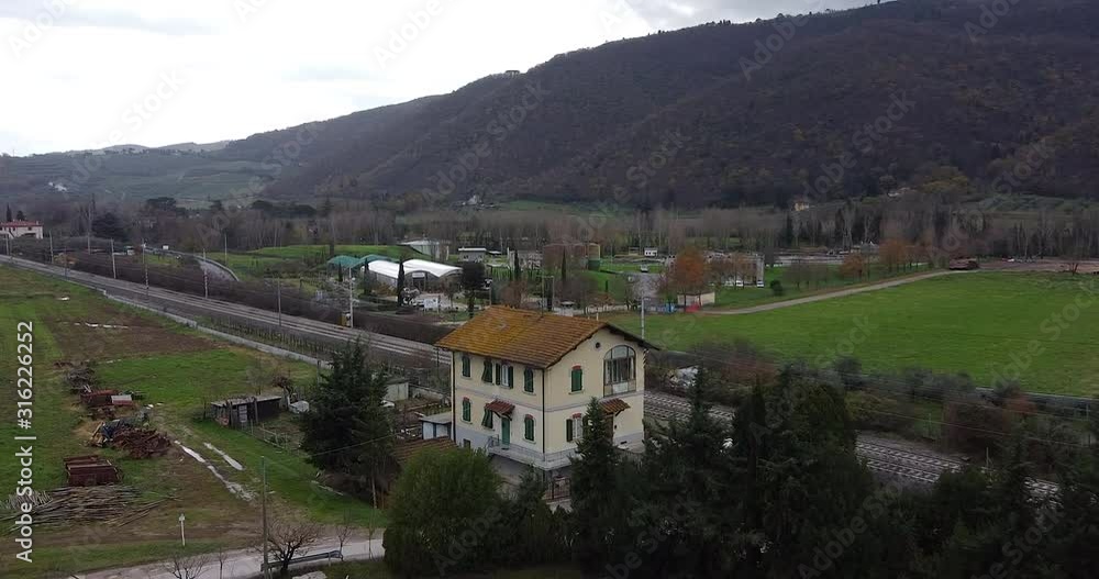 Cantoniera residential house aerial orbit right across Frescobaldi vineyard Chianti countryside plantation. Arno river valley near Florence. Pontassieve, Tuscany. Italy Cantoniera residential house aerial orbit right across Frescobaldi vineyard Chianti countryside plantation. Arno river valley near Florence. Pontassieve, Tuscany. Italy