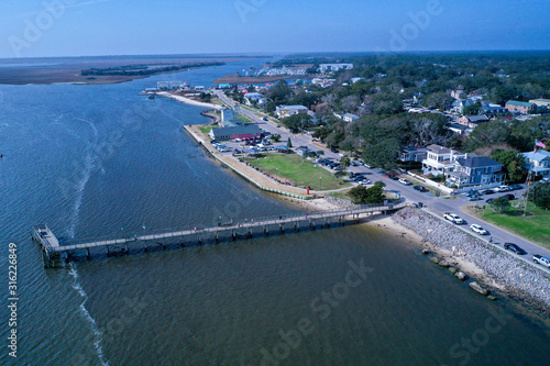  Aerial view of the town of Southport NC pier. Looking over the cape fear river at the city water front. © Rick