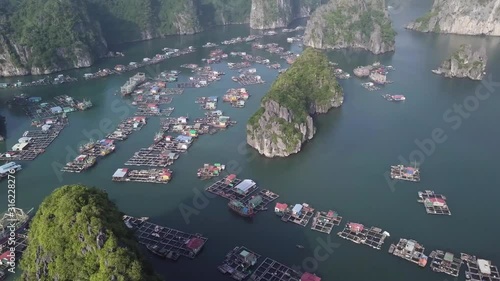 Halong bay and its floating village by bird view  in Vietnam during a cruise