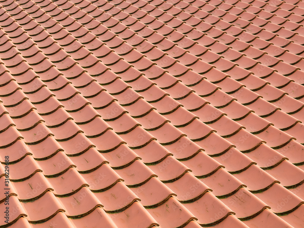 background of red steel corrugated roof. 