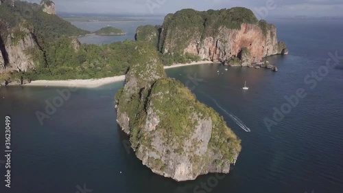 Famous Railay Bay and beach in Krabi Thailand during a sunset