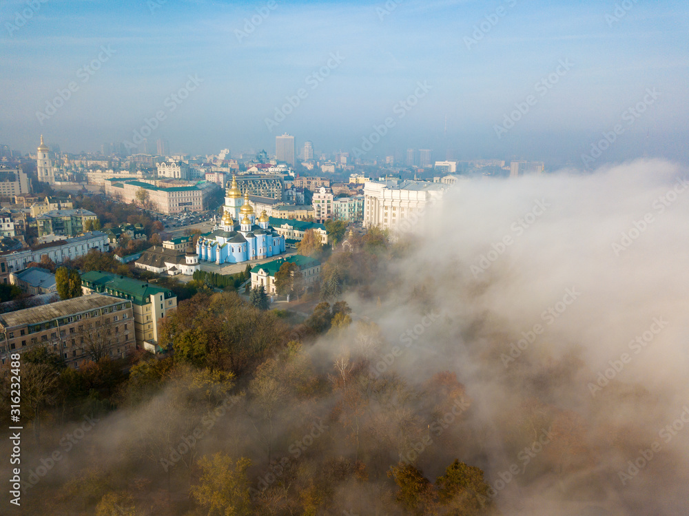 Obraz premium Aerial drone view. St. Michael's Cathedral in Kiev in a light morning fog.