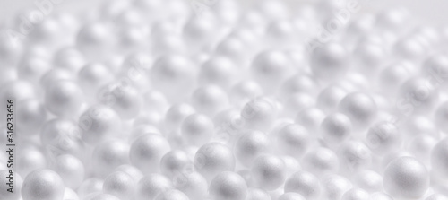 Abstract white background. White foam balls. Mysterious objects, macro.