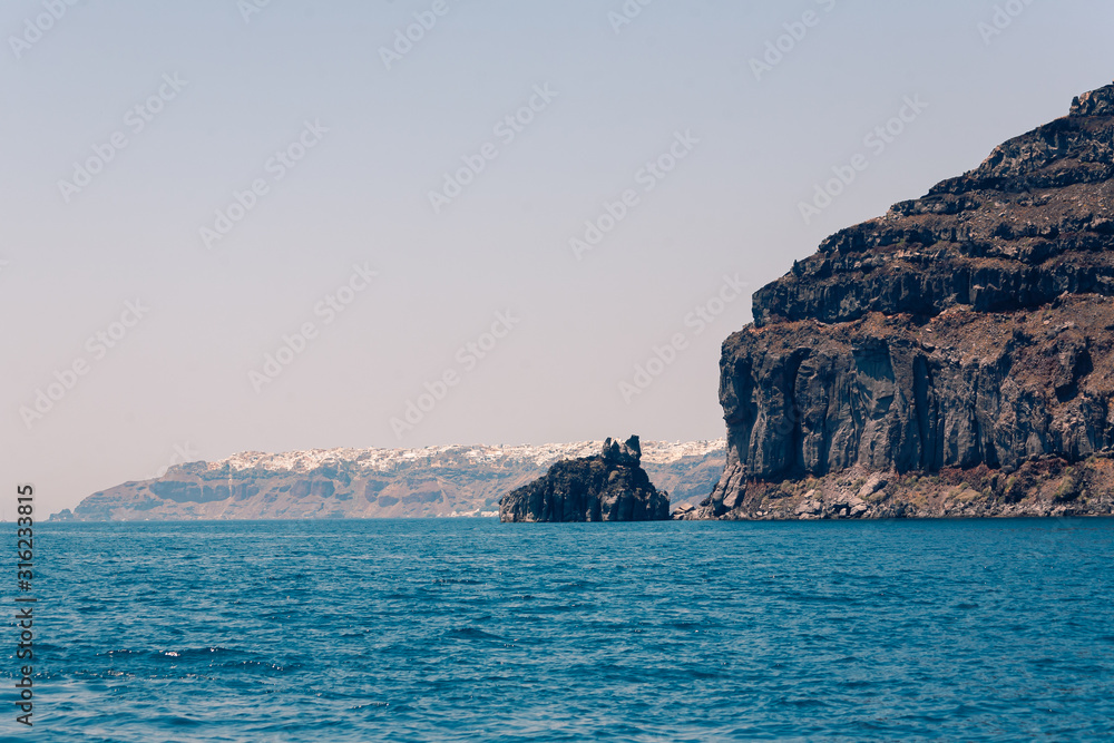 View on the sea near Santorini island at Greece summer sunny day