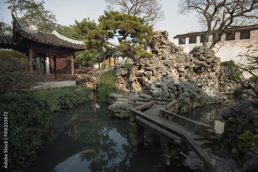 The rockery view at Mountain Villa with Embracing Beauty(Hanxiu Shanzhuang).Mountain Villa with Embracing Beauty built on 1850 also on UNESCO World Heritage Site. The rockery view at Mountain Villa with Embracing Beauty(Hanxiu Shanzhuang).Mountain Villa with Embracing Beauty built on 1850 also on UNESCO World Heritage Site.