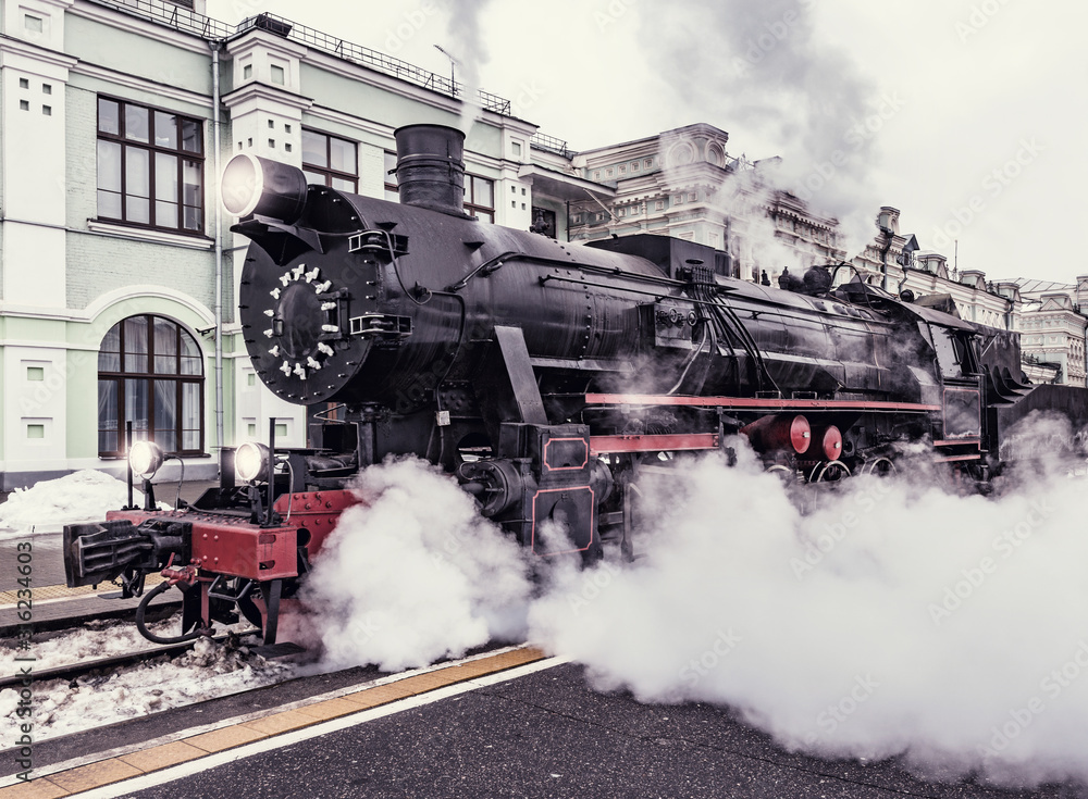 Departure of the retro steam train at evening time. Departure of the retro steam train at evening time.