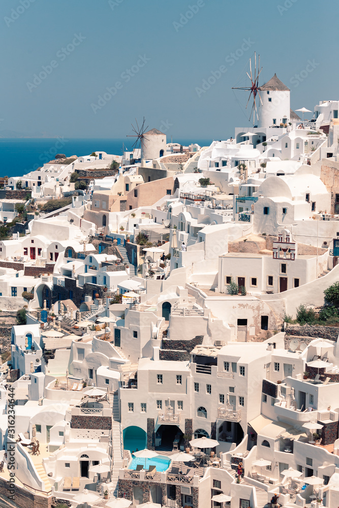 Classic view on the buildings and decoration at the FIra - capital of Santorini, Greece