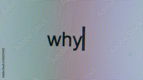 Cursor Typing Out The Word Why With Question Mark Flashing Cursor On Computer Screen Bright White Blank Page. Thinking Of Something To Write. Empty Page Writers Block Confused
