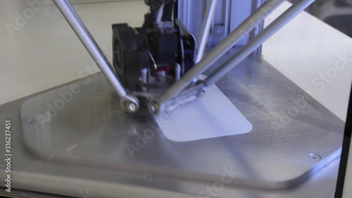 3d printer working with a model in time lapse speed. Fab Lab educational use.