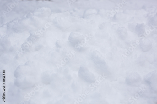 pure white snow texture, snowdrift on the street in winter