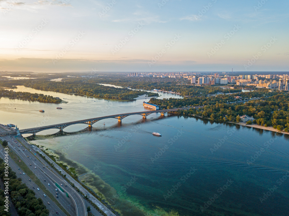 Aeiral drone view. Dnieper river in Kiev at sunset.