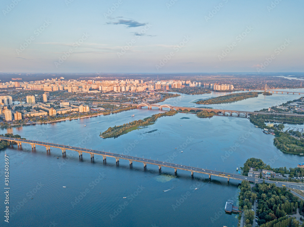 Aeiral drone view. Dnieper river in Kiev at sunset.