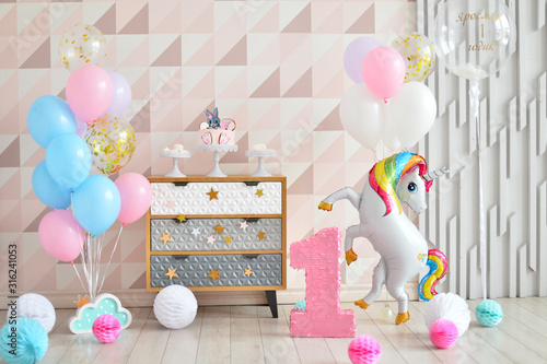 One year birthday decorations. A lot of balloons. 