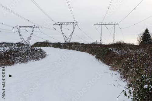 Snow Covered Pat Under Power Lines