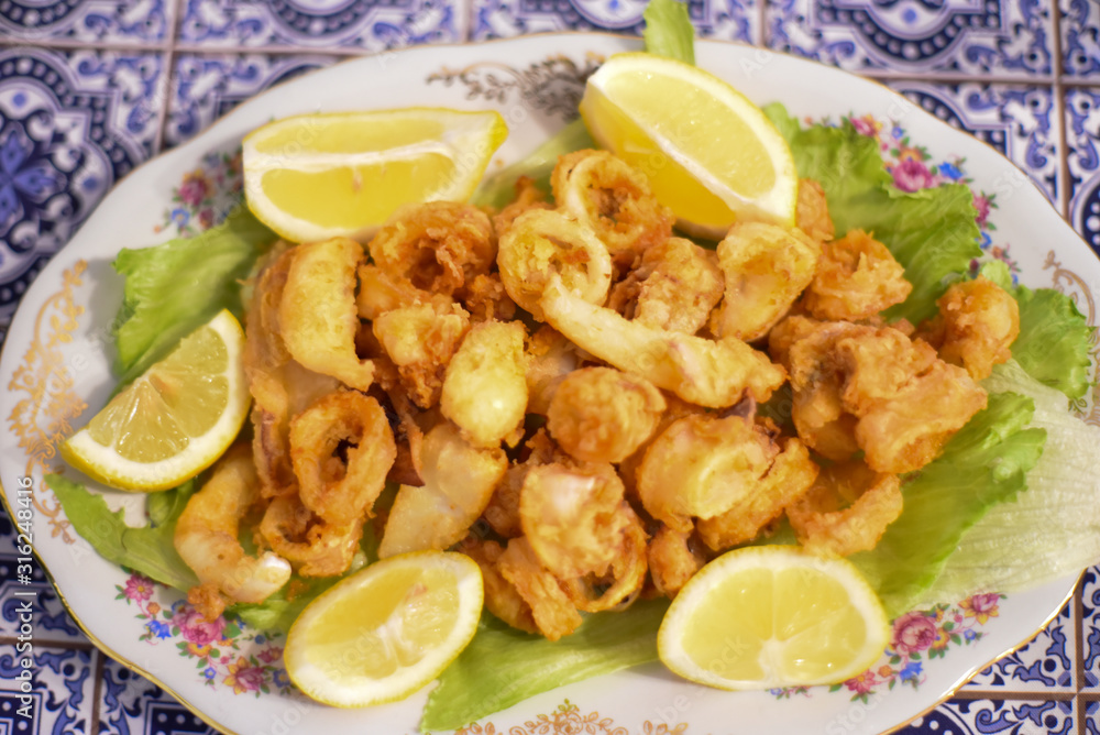 Fried Squid Rings in the Plate Fried Squid Rings in the Plate