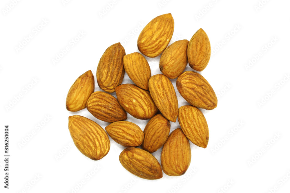 Pile of Almonds, Top View. White isolated background.Depth of Field. Pile of Almonds, Top View. White isolated background.Depth of Field.