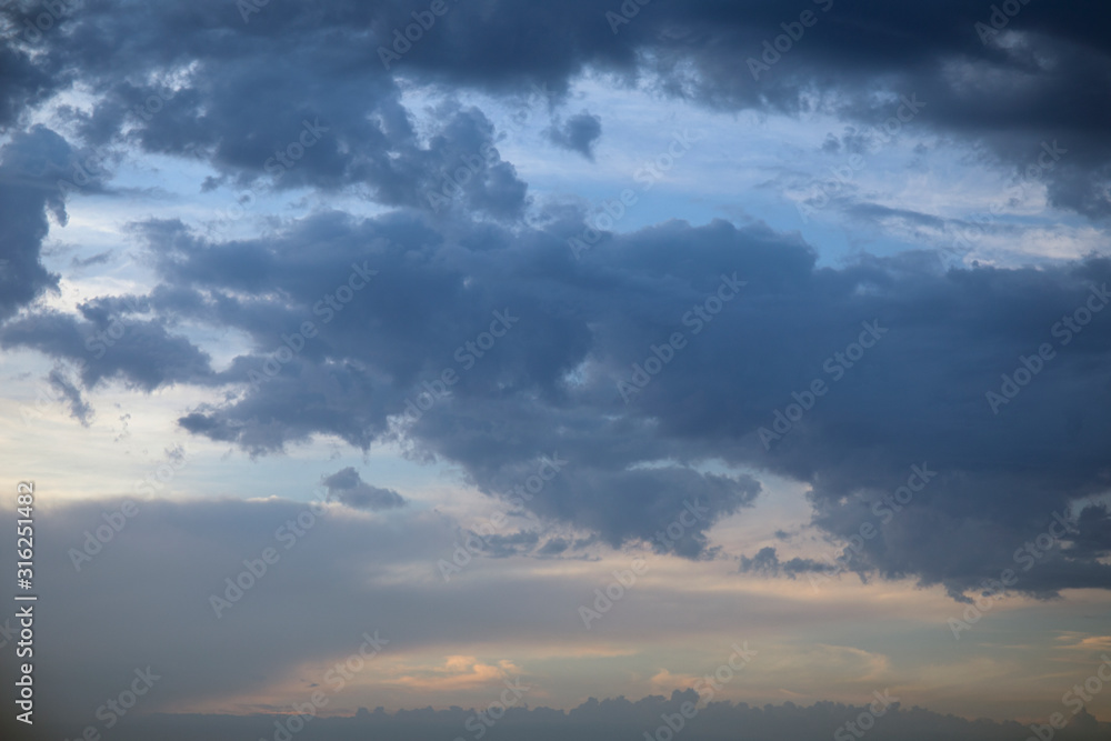 Dark clouds on evening sky, cumulus clouds high, beautiful aerial cloudscape view from above Dark clouds on evening sky, cumulus clouds high, beautiful aerial cloudscape view from above