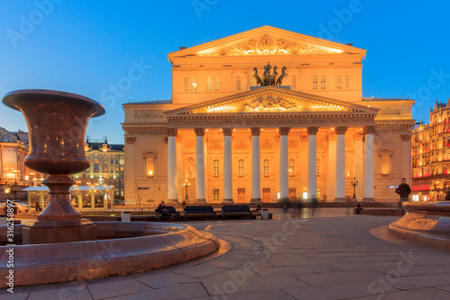 Bolshoi Theatre (Big Theatre) is historic theatre in Moscow, Russia, originally designed by architect Joseph Bove, which holds ballet and opera performances. Moscow. Facade in evening light