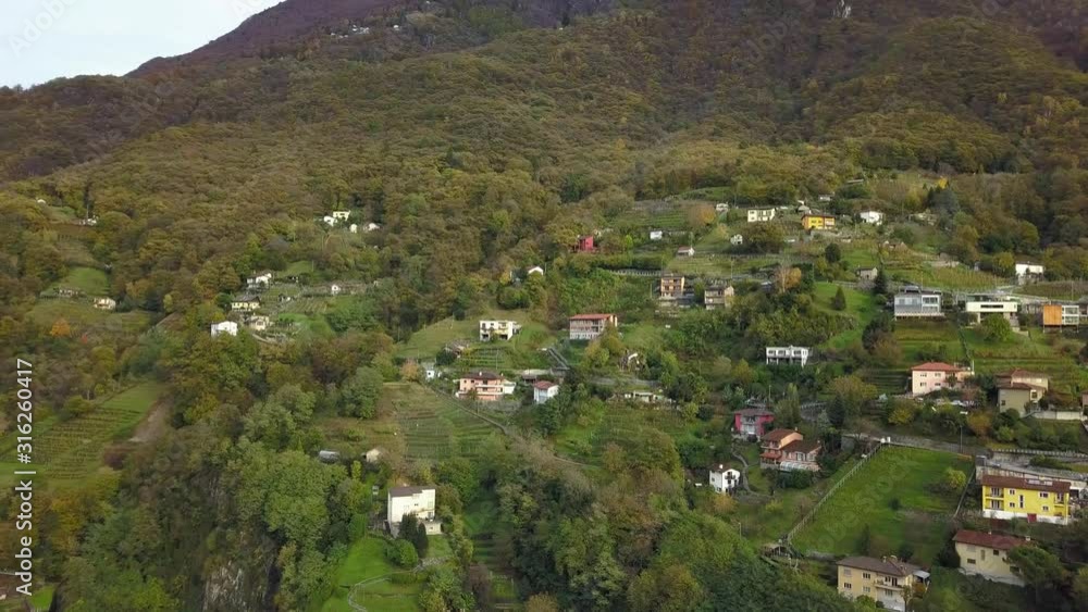 Houses on the hillsides of Bellinzona town in Swiss Alps Houses on the hillsides of Bellinzona town in Swiss Alps