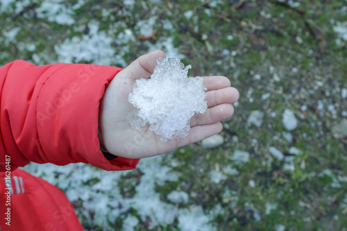 Snow ice on a child’s hand