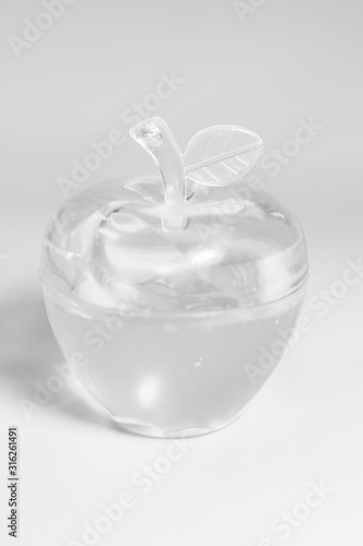 Black and white or infrared glass apple. Decorative apple. Gift