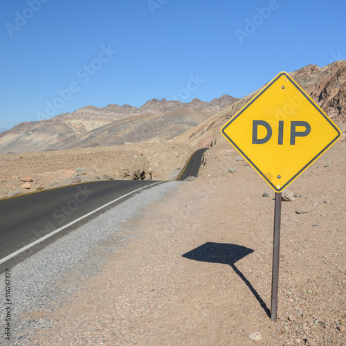 Dip in the road
