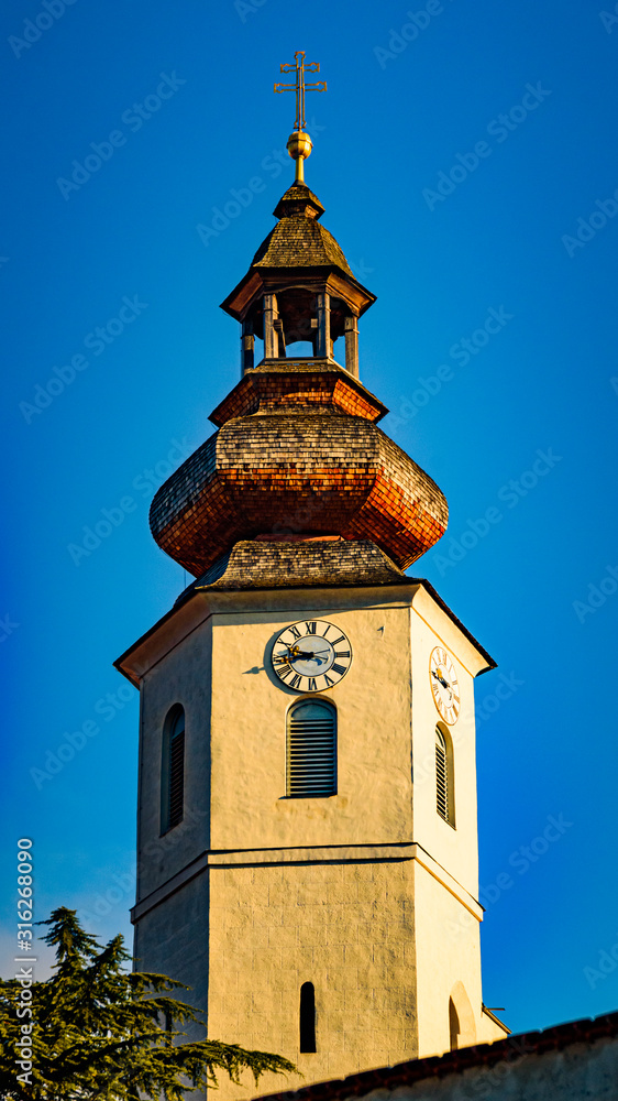 Frohnleiten church tovwer above Mur river in Styria,Austria. Famous travel destination.