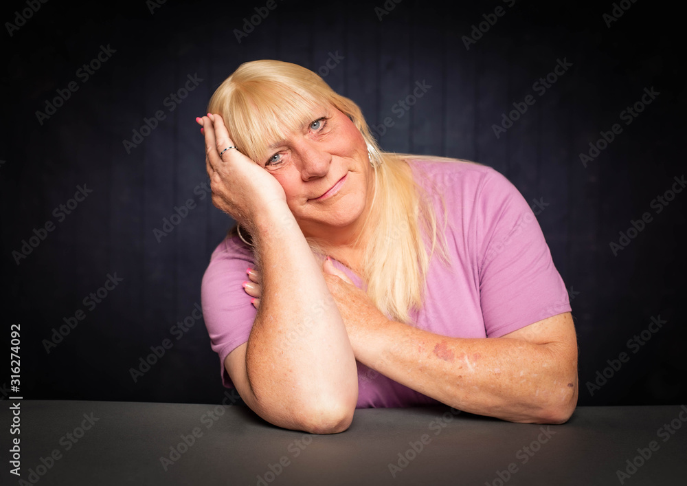 Trans Woman with Head Resting on Her Hand Trans Woman with Head Resting on Her Hand